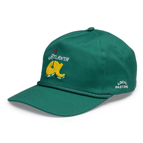 A green baseball cap featuring an embroidered yellow and white 'Atlanta' logo with a golf ball graphic on the front, and 'LOCAL PASTIME' embroidered in white on the side. The cap has a braided green rope detail across the brim and is photographed on a clean white background.